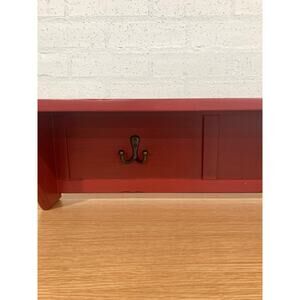 Pottery Barn Kids hanging shelves with hooks